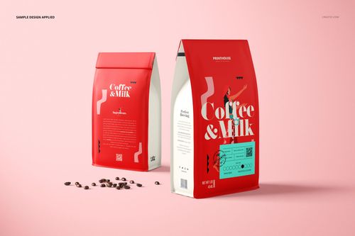 PSD mockup of side gusset bags in red and cream tones, presented on a soft pink surface with coffee beans nearby.
