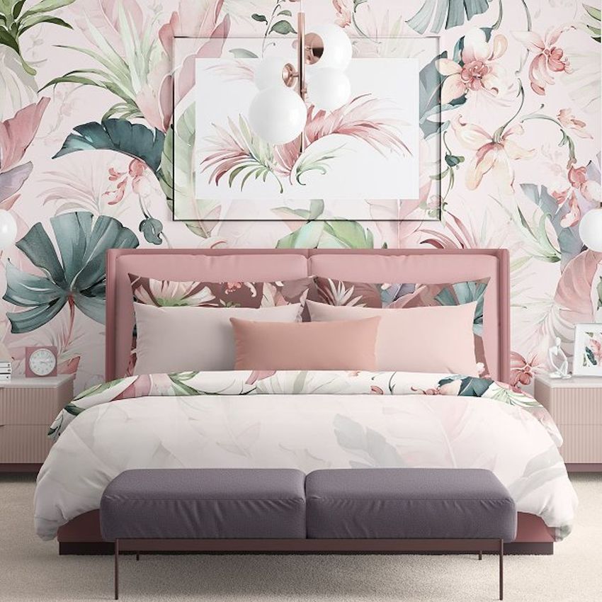 Bedroom scene bedding mockup featuring a bed with tropical watercolor floral patterns, pastel colors, and matching wallpaper.