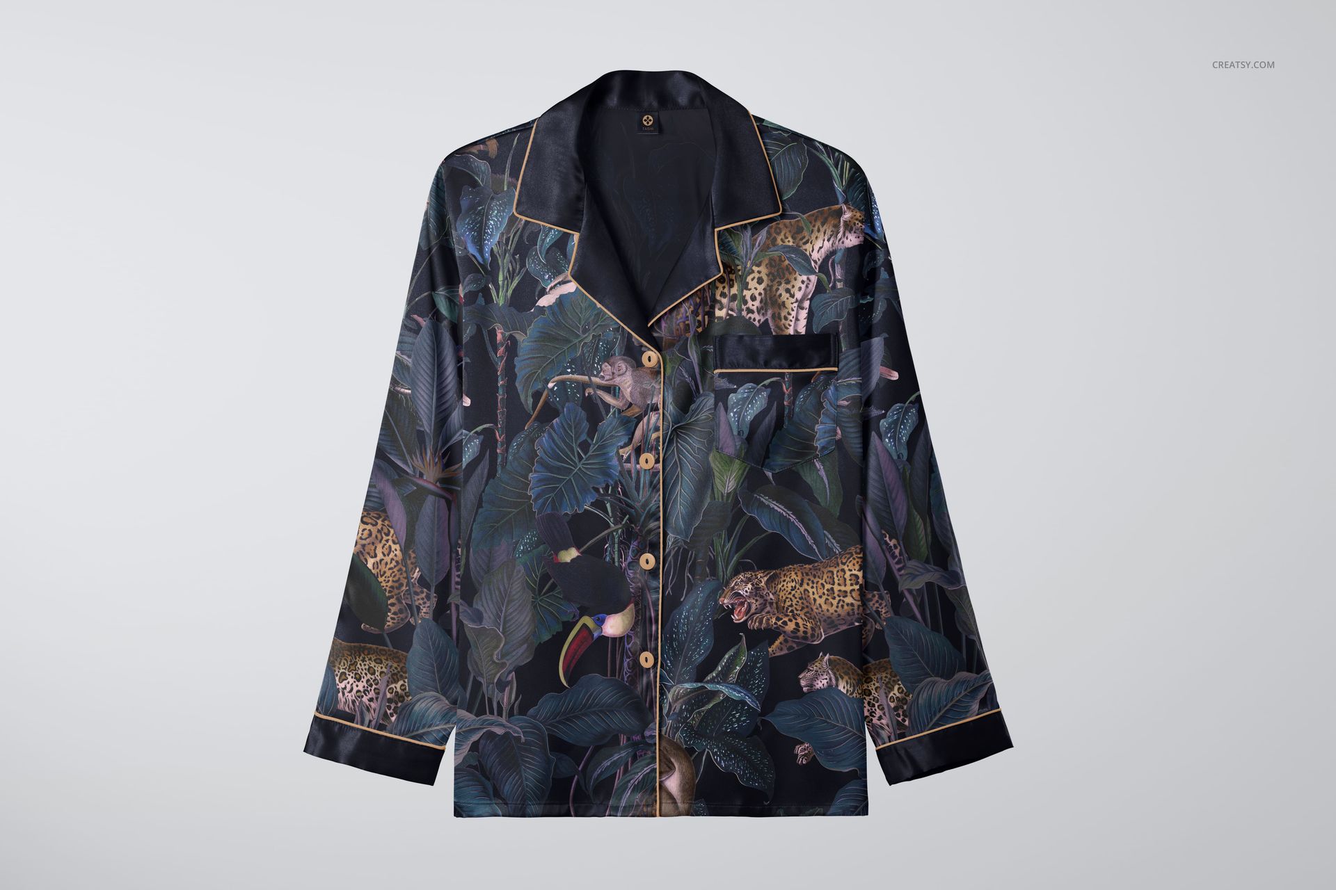 PSD mockup of a long-sleeve adult pyjama top with a dark leaf and wild animal motif, presented from the front.