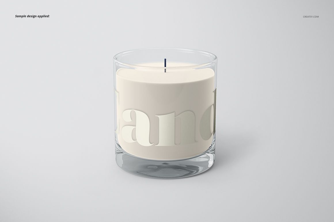Classic candle mockup featuring a transparent jar, neutral wax color, and subtle label design on a simple surface.