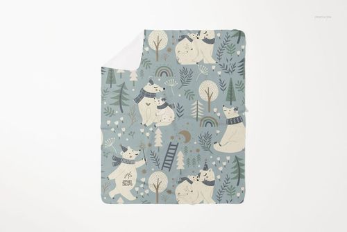 Fleece blanket with rounded corners featuring a playful bear and tree pattern in muted blue and beige, top view.