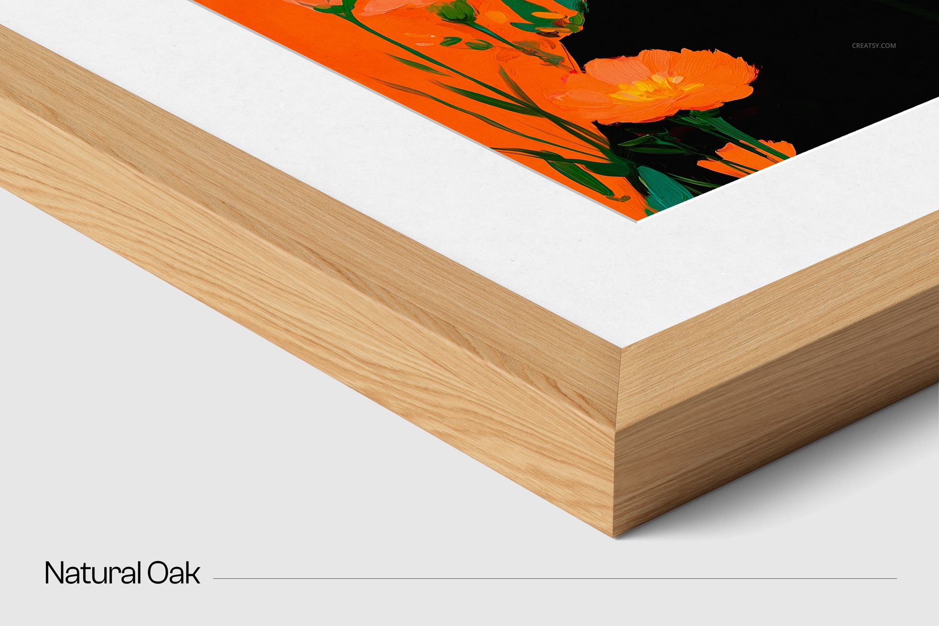 Solid wood frame mockup in natural oak texture, showing white matte and colorful floral art from an angled perspective.