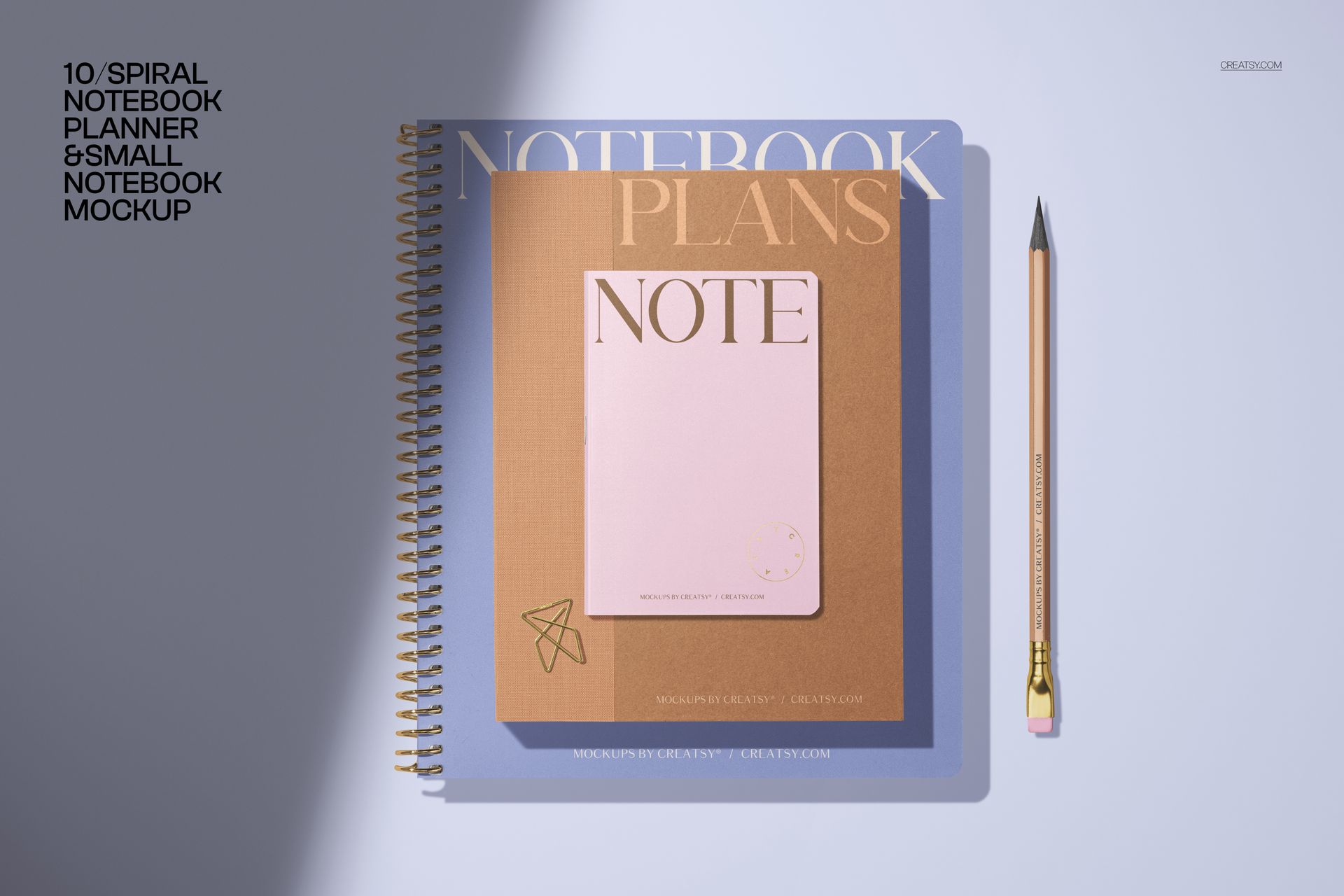 Stationery mockup bundle showing blue and brown spiral notebooks, a pink notepad, and a pencil arranged on a desk.