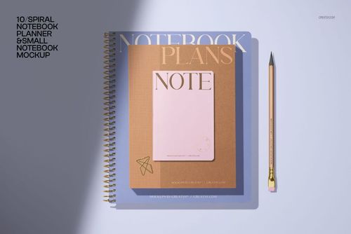 Stationery mockup bundle showing blue and brown spiral notebooks, a pink notepad, and a pencil arranged on a desk.