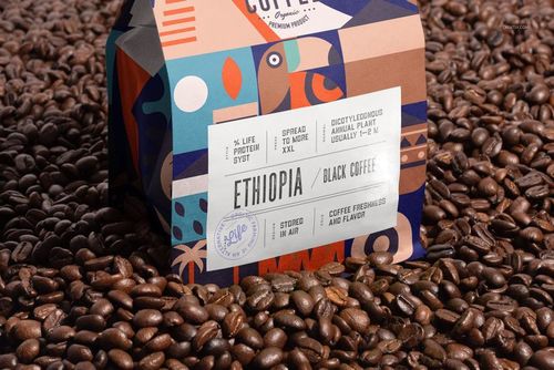 Coffee bag mockup featuring a vibrant design and label, surrounded by scattered coffee beans in close-up.
