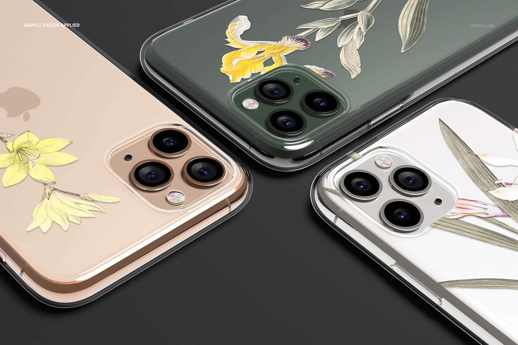 Angled view of three iPhone 11 Pro mockups with transparent cases and illustrated flower patterns.