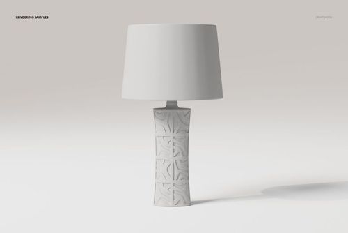 Front view of a decorative table lamp with a textured geometric base and plain white lampshade on a light background.
