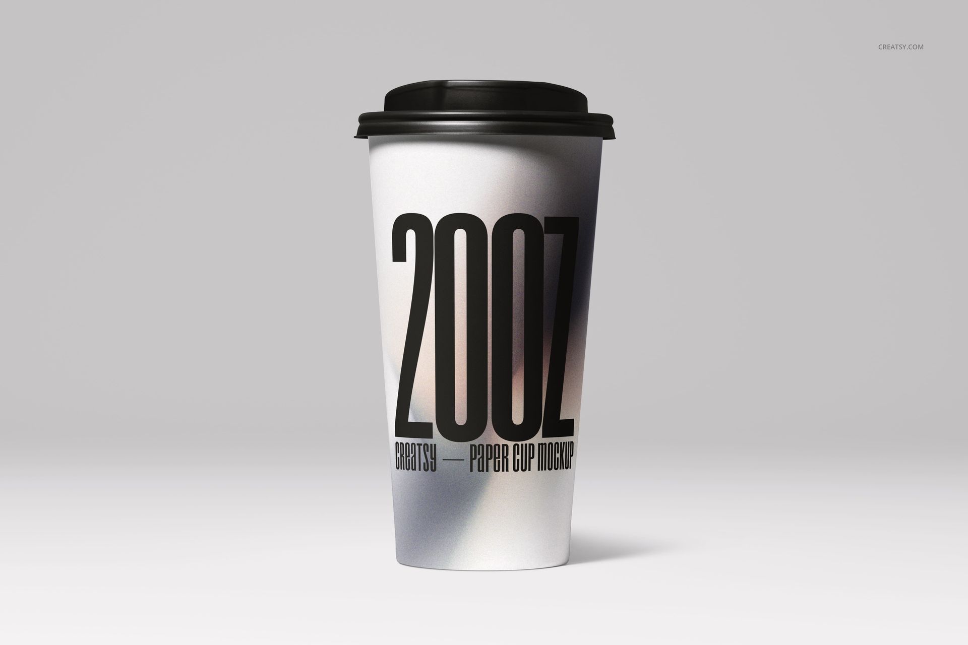 Single paper cup mockup shown upright with a black lid and large vertical text, set against a plain light background.
