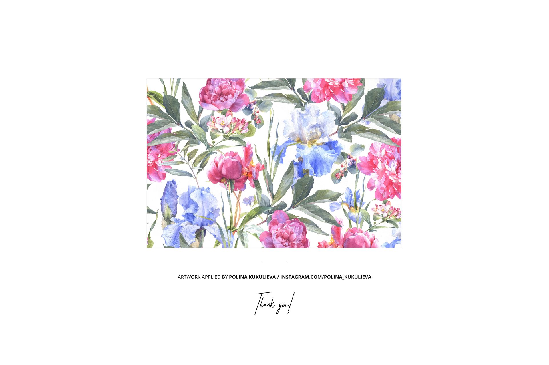 PSD mockup of folded fabric with colorful floral design, including pink peonies and blue irises, centered on white.