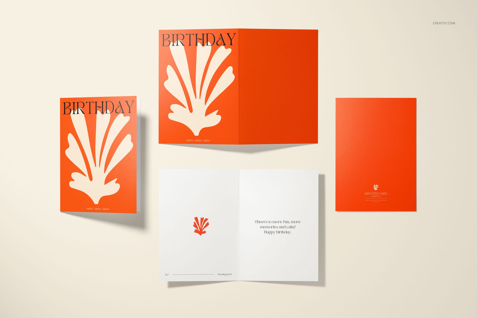 Greeting card mockup set featuring orange and white cards with bold abstract design, shown from top view on a light background.