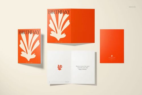 Greeting card mockup set featuring orange and white cards with bold abstract design, shown from top view on a light background.