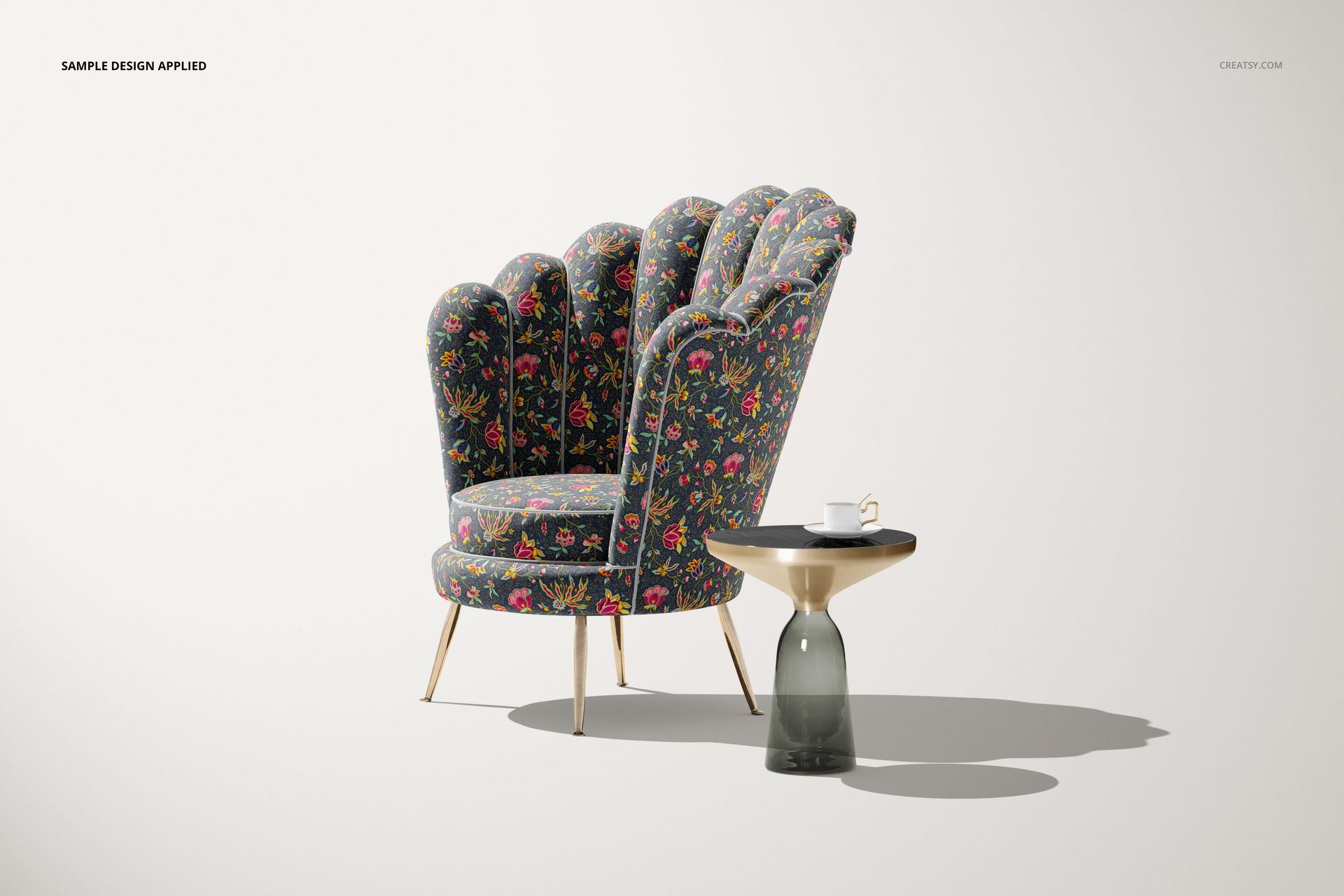 Floral-patterned velvet shell armchair mockup shown in a well-lit scene with a modern side table and neutral backdrop.