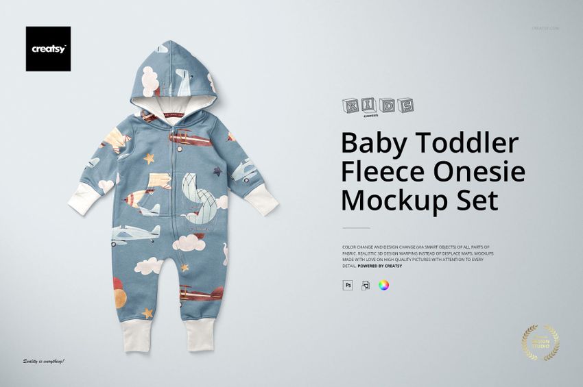 Front view of a baby toddler fleece onesie mockup with a blue background and playful cloud and airplane pattern.