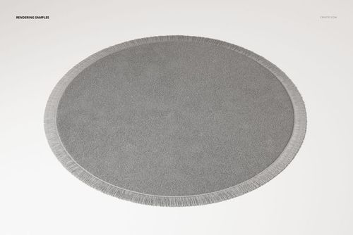 Round fringed rug in light gray color shown from a top view on a plain white background, highlighting its texture.