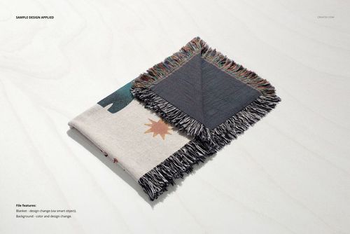 Jacquard fringed woven throw blanket mockup featuring a folded blanket with multicolored fringe on a light surface.