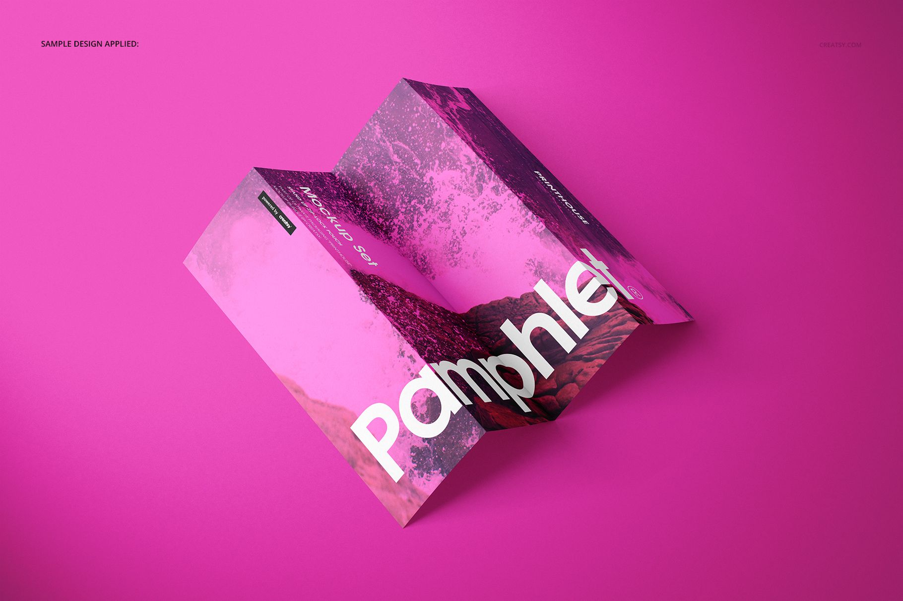 Tri-fold pamphlet mockup displayed on a solid pink background, featuring abstract pink and purple artwork.