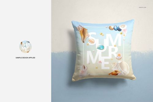 Front-facing PSD mockup of a decorative pillow with a pastel blue gradient and seashell graphics on a neutral wall.