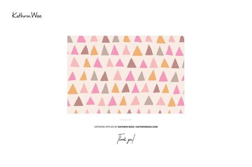 Top view of jersey fabric mockup featuring a repeating pattern of pastel-colored triangles on a light background.