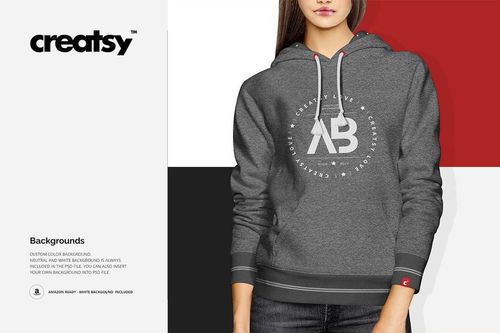 PSD mockup of a women's hoodie in dark gray with a printed white logo, displayed from the front on a model.