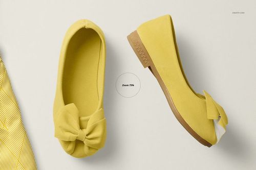 PSD mockup of baby shoes in yellow, featuring bow details and brown soles, arranged on a soft beige background.
