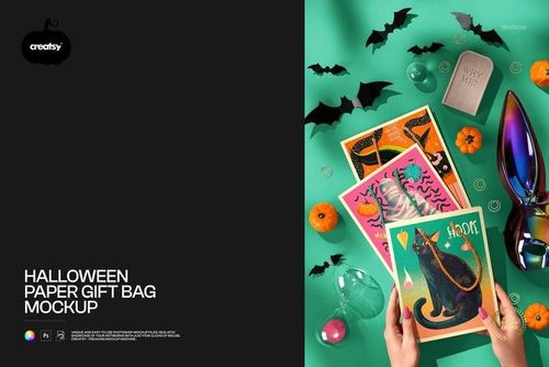 PSD mockup showing Halloween paper gift bags with illustrated patterns, surrounded by seasonal decorations and props.