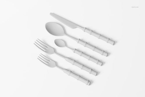 Top view of a bamboo cutlery set with five pieces, including forks, spoons, and a knife, in neutral tones on a white background.