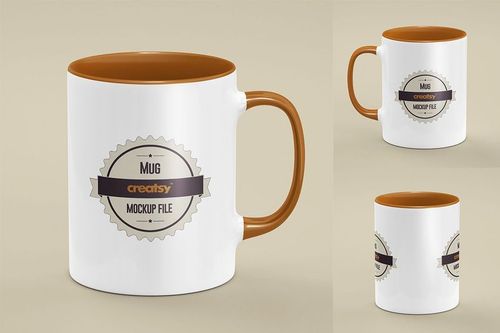 PSD mockup of a white mug featuring a brown interior, rim, and handle, displayed in three different perspectives.