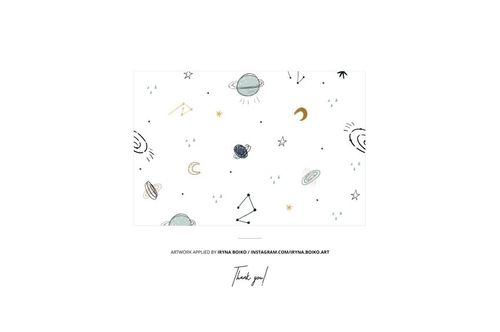 Kids bed sheet mockup featuring a white sheet with hand-drawn planets, stars, and celestial motifs in soft colors, top view.