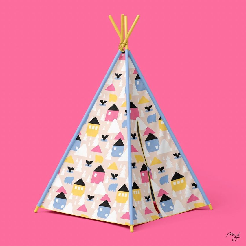 Teepee tent mockup with a colorful pattern of houses, bears, and mountains on a pink background, viewed from the front.