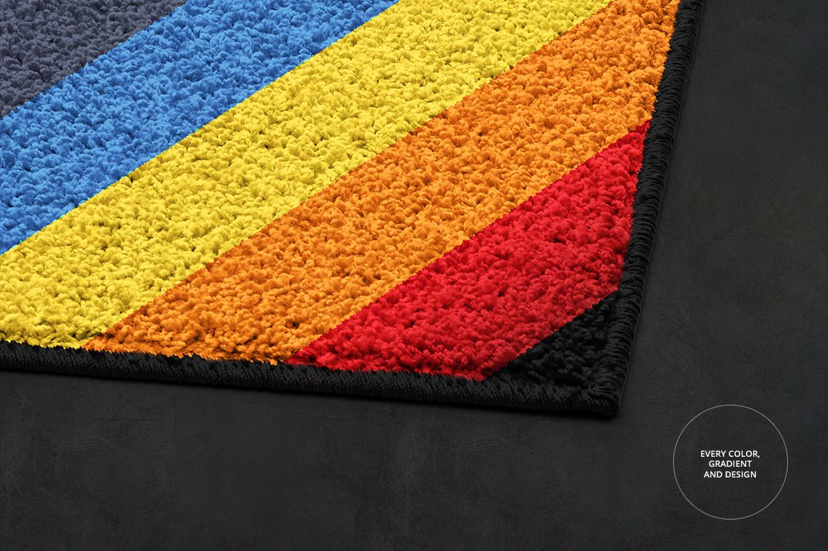 Detailed corner of a striped rug mockup with textured surface, showing yellow, orange, red, and black bands on a dark background.