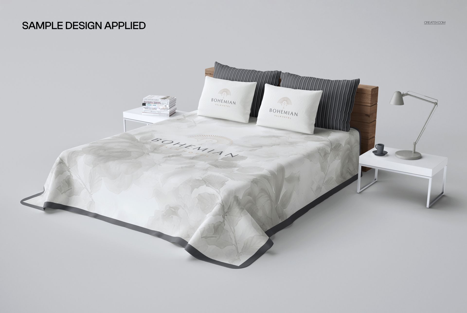 PSD mockup showing a plain and quilted bed coverlet with soft floral design, paired with pillows and bedside tables.