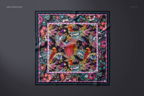 Square cashmere scarf mockup featuring a colorful tropical bird and floral pattern, displayed flat on a dark surface.
