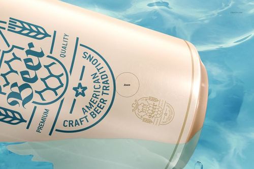Drinkware can mockup partially submerged in water, showing a beige can with blue decorative elements, front angle.