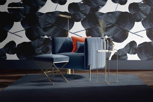 Blue velvet armchair and stool mockup shown with gold legs, orange cushion, and side table in a modern interior.