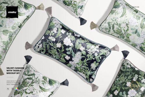 PSD mockup of rectangular velvet cushions with tassels, displaying leafy and floral patterns, viewed from above.