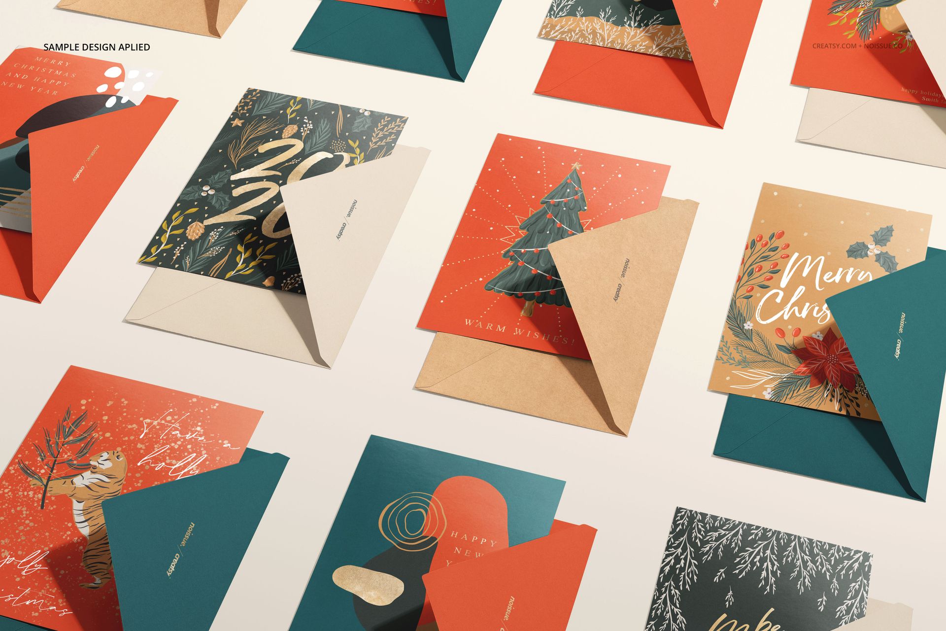 Mockup set featuring various cards and envelopes in teal, orange, and kraft tones with seasonal illustrations.