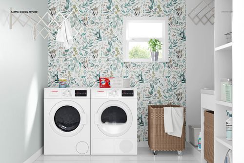Laundry room mockup featuring two front-loading white washing machines, patterned wallpaper, wicker baskets, and a window.