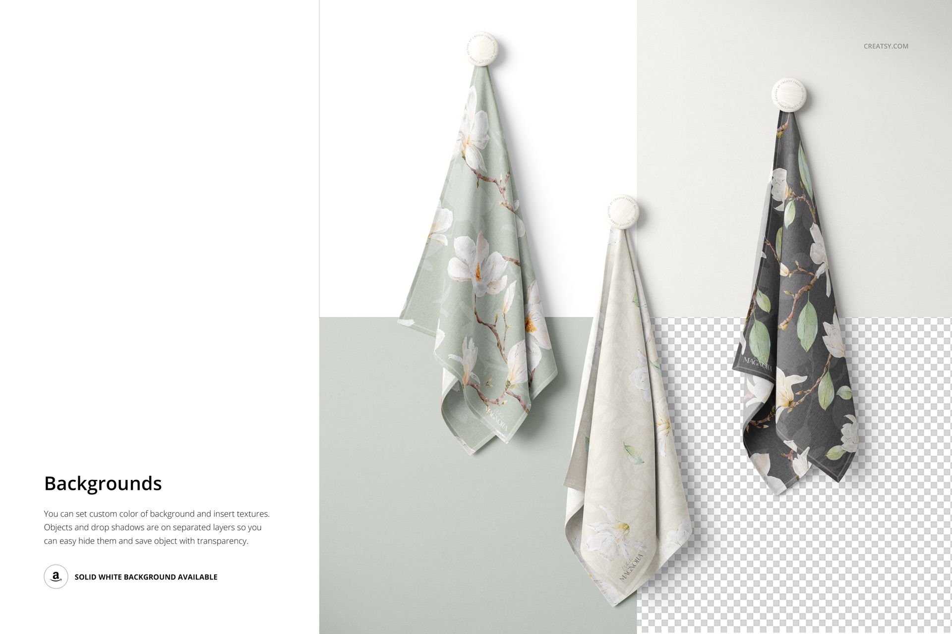PSD mockup showing three draped fabrics with botanical designs, each suspended against a divided white and gray backdrop.