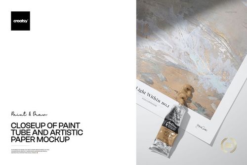 Paint tube and textured art paper mockup shown from an angled top view, featuring neutral and gold tones.