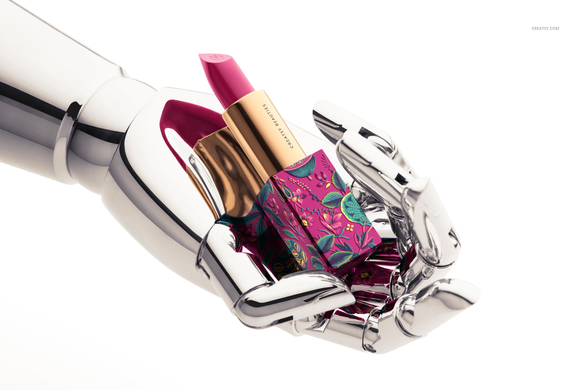 Classic lipstick mockup featuring a bright pink lipstick in a decorative gold case, displayed in a chrome mannequin hand.