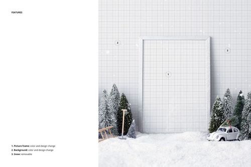 Front view of a wooden picture frame mockup set in snowy scenery with small pine trees and a miniature car.