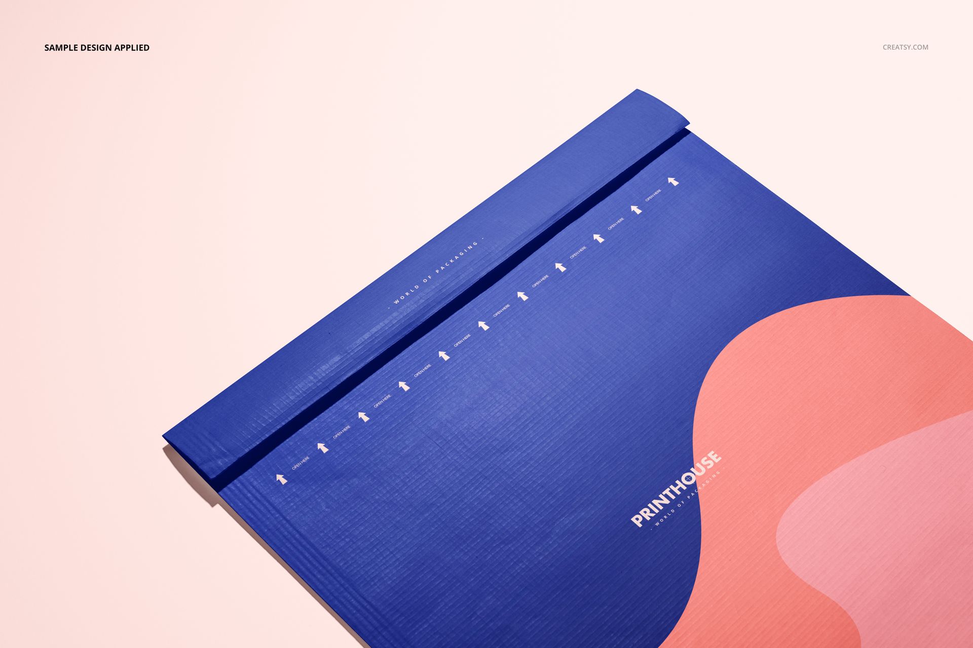 Mockup of a rectangular envelope featuring a textured blue surface and curved pink design, viewed from above.