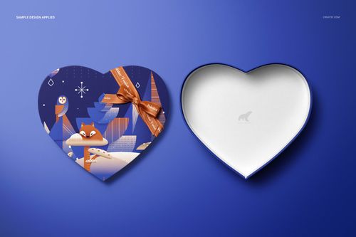 Heart-shaped chocolate box mockup set with one decorated lid and one open empty box on a blue background, top view.