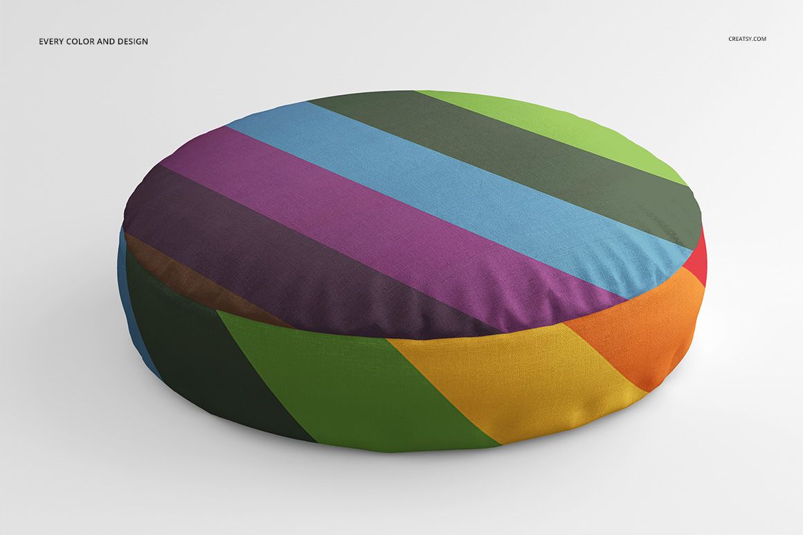 Mockup of a round cotton pillow with vibrant diagonal stripe pattern, viewed from the front on a neutral surface.