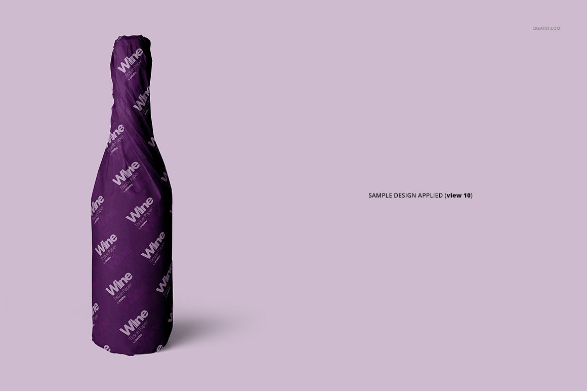 Mockup of a wine bottle covered in purple wrapping tissue paper with white lettering, shown against a plain light background.