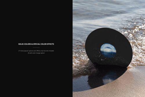 Vinyl record mockup showing a round black disc wedged into sandy shoreline as water gently laps nearby.