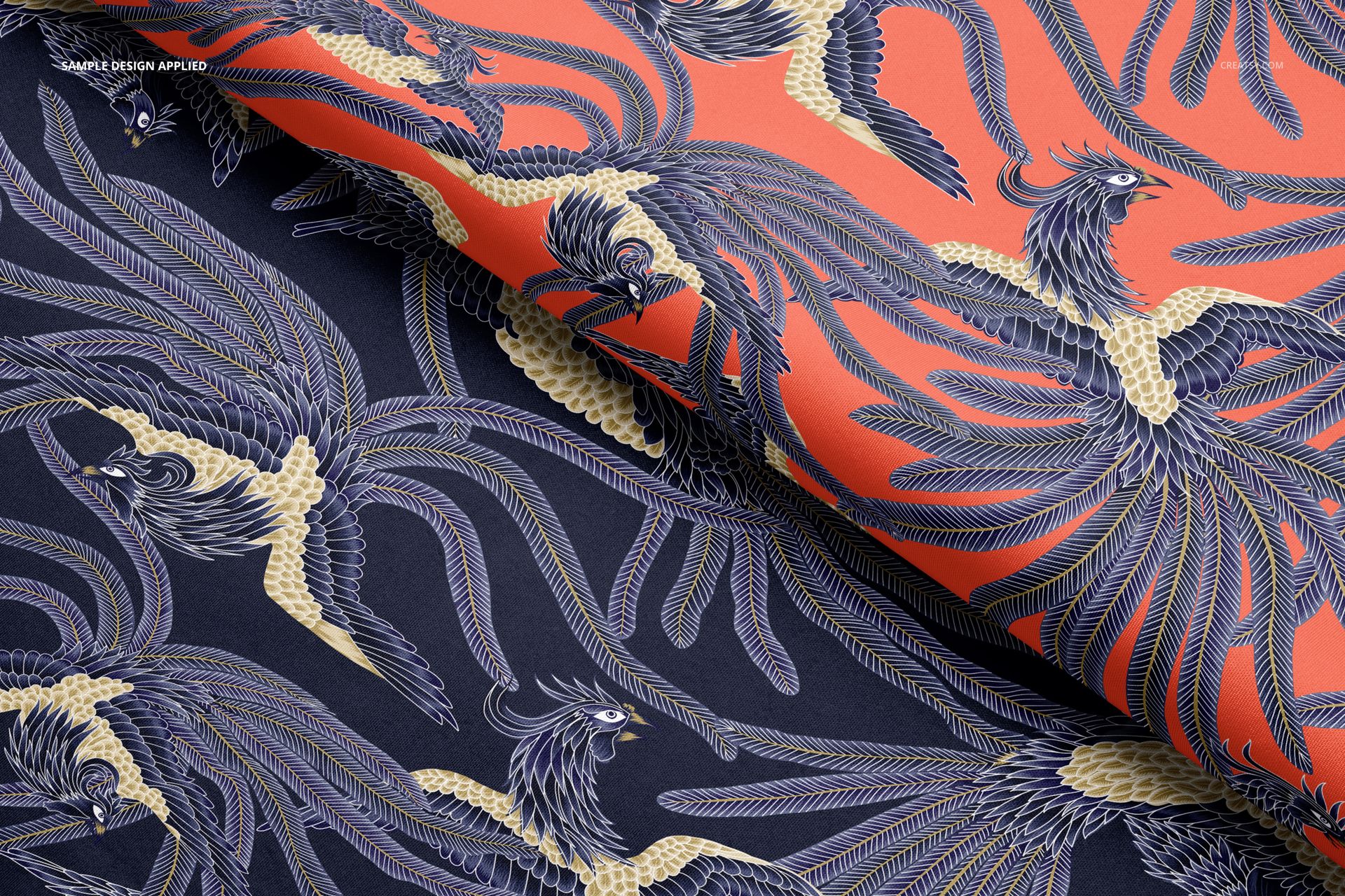Close-up view of scuba fabric mockup featuring intricate bird and feather designs in navy blue and coral orange.