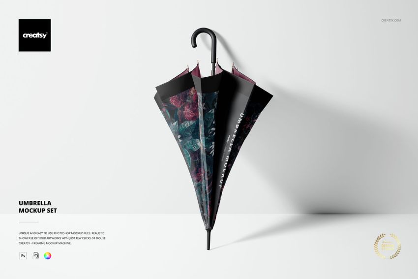 Front view of a closed umbrella mockup featuring a colorful floral design and black curved handle on a plain backdrop.