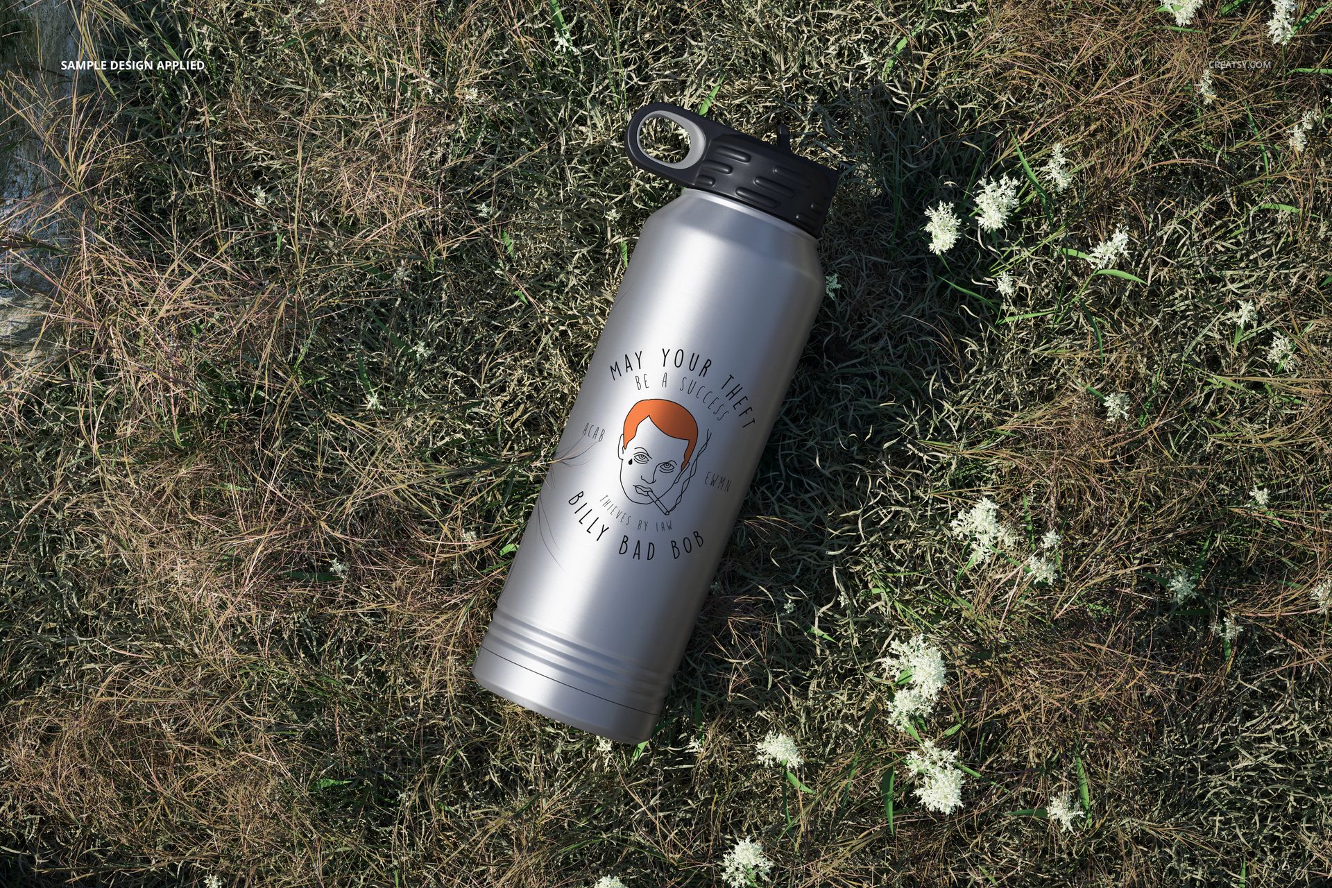40 oz. stainless steel water bottle mockup with a custom graphic, shown from above on a grassy outdoor surface.