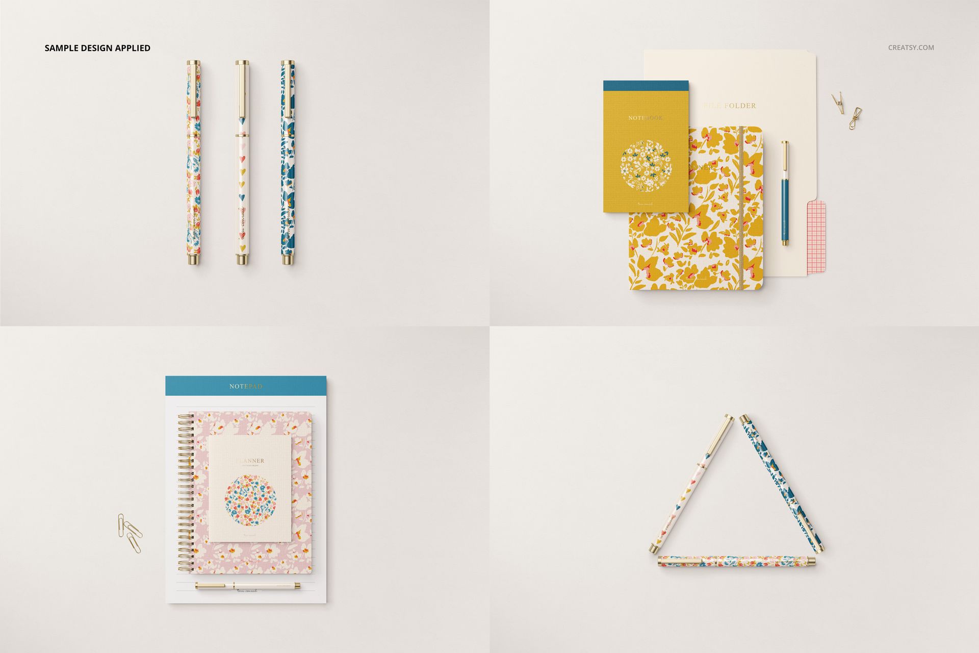 Top view of a stationery set mockup featuring patterned pens, floral notebooks, and plain folders on a neutral background.